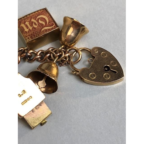 2 - 9ct Gold Charm Bracelet with approx seventeen charms to include Cupid, a British Passport, Archer, c... 