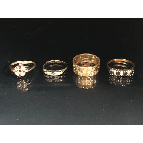 20 - Four 9ct Gold rings set with various stones (total weight approx 10.9g) all as found