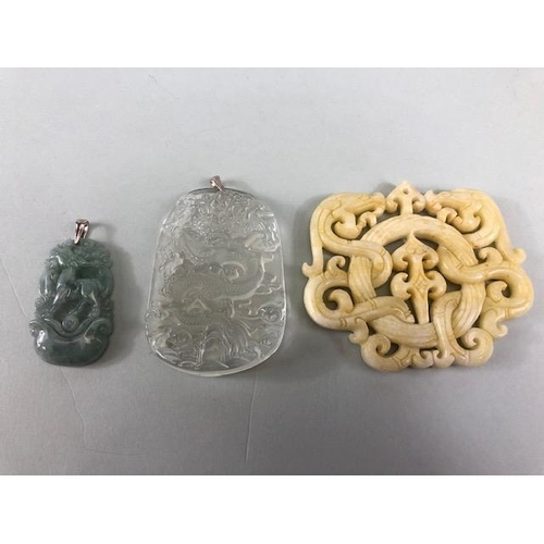 21 - Chinese Jewellery, green stone pendant carved with a mythical Fuzhu, approximately 4cm, a mutton fat... 