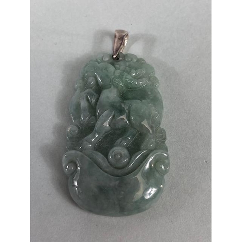 21 - Chinese Jewellery, green stone pendant carved with a mythical Fuzhu, approximately 4cm, a mutton fat... 