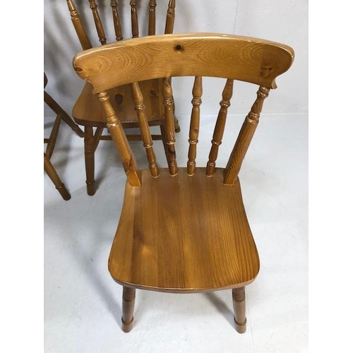 219 - Pine Furniture, 4 modern Pine turned spindle back dining chairs with curved back support  in a Victo... 