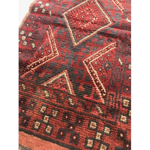 221 - Oriental carpet, Wool hand knotted Meshwani Runner, Geometric design on red background approximately... 