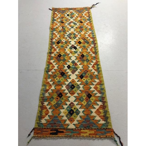 223 - Oriental Rug, Wool hand Knotted Chobi Kilim Runner, colourful geometric designs , approximately 200 ... 