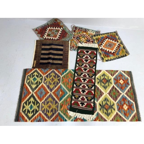 225A - Oriental Rugs, collection of hand woven prayer mat size wool rugs with geometric designs, 4 approxim... 