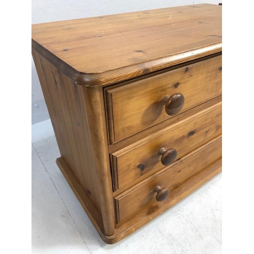 226 - Pine Furniture, modern  Low chest of 3 drawers on casters approximately 79 x 42 x 55 cm and a matchi... 