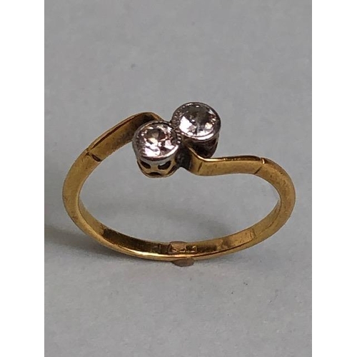 22A - Antique 18ct yellow gold ring mounted with 2 diamonds in a cross over design, approximately K 1/2 an... 