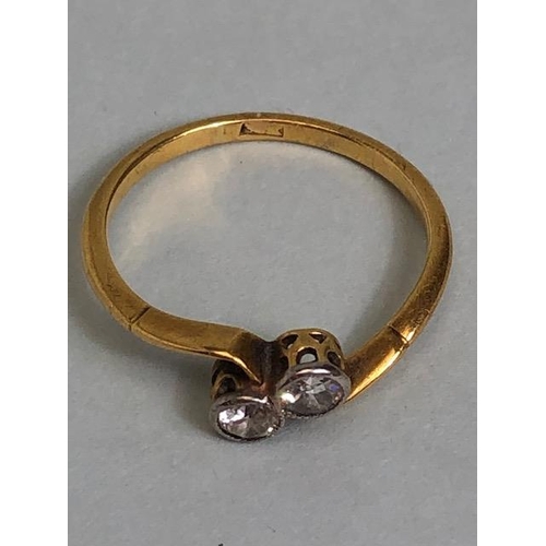 22A - Antique 18ct yellow gold ring mounted with 2 diamonds in a cross over design, approximately K 1/2 an... 