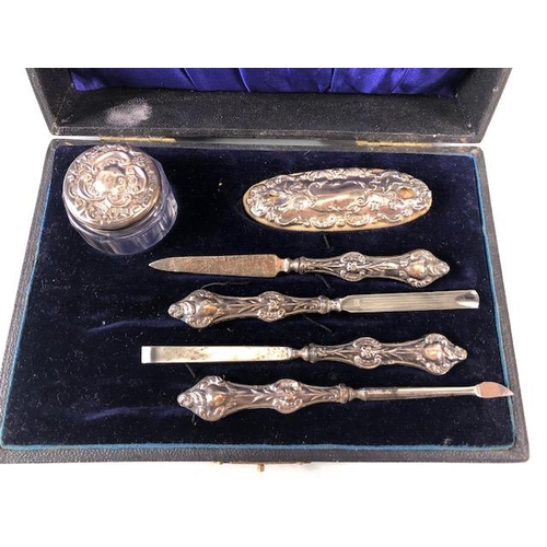 27 - Hallmarked silver mounted and boxed manicure set hallmarked for Birmingham by maker G & C Ltd