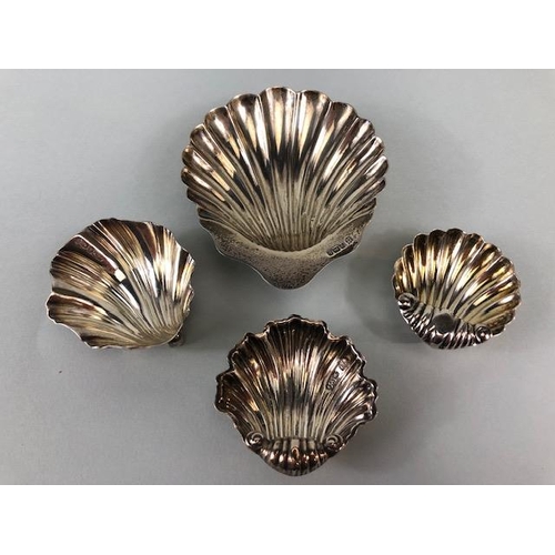 3 - Collection of four Hallmarked English silver shell designed salts, the largest 10 x 8cm and total we... 