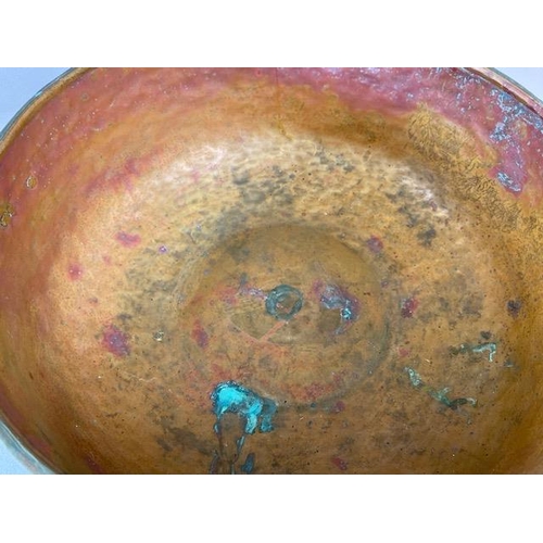 315 - Copper Pan, large deep hand planished copper pan with twin brass handles approximately 44cm across