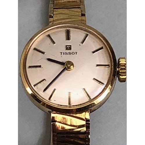 33A - 9ct yellow gold ladies Tissot watch on 9ct tapered bark finish bracelet  approximately 14.98g total,... 