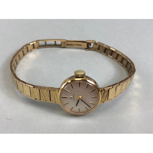 33A - 9ct yellow gold ladies Tissot watch on 9ct tapered bark finish bracelet  approximately 14.98g total,... 