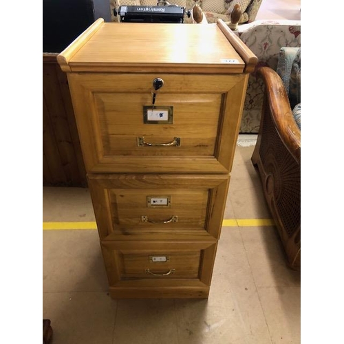 377 - Modern office filing cabinet in a blond elm finish, run of 3 drawers with brass fittings approximate... 