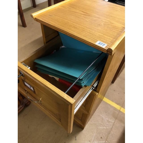 377 - Modern office filing cabinet in a blond elm finish, run of 3 drawers with brass fittings approximate... 