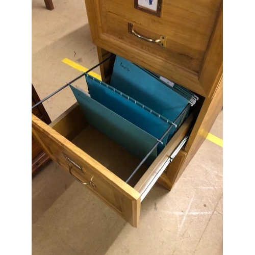 377 - Modern office filing cabinet in a blond elm finish, run of 3 drawers with brass fittings approximate... 