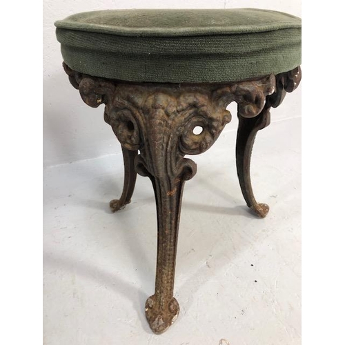 378 - Antique Victorian style cast iron dressing table stool, round padded upholstered top on four gothic ... 