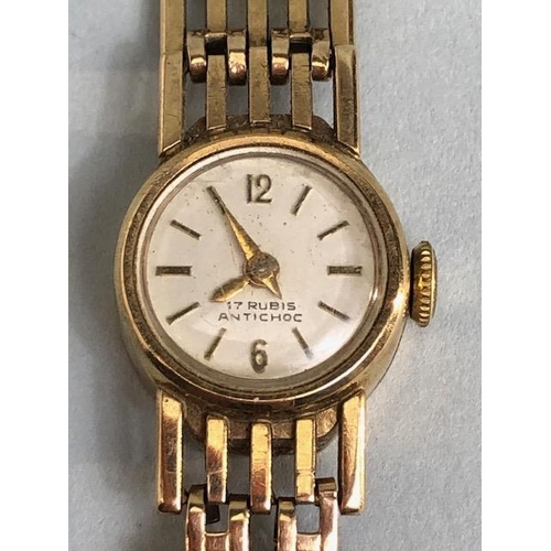 4 - 9ct Gold Ladies wristwatch with 9ct Gold gate link bracelet strap, the watch face marked 17 RUBIS AN... 