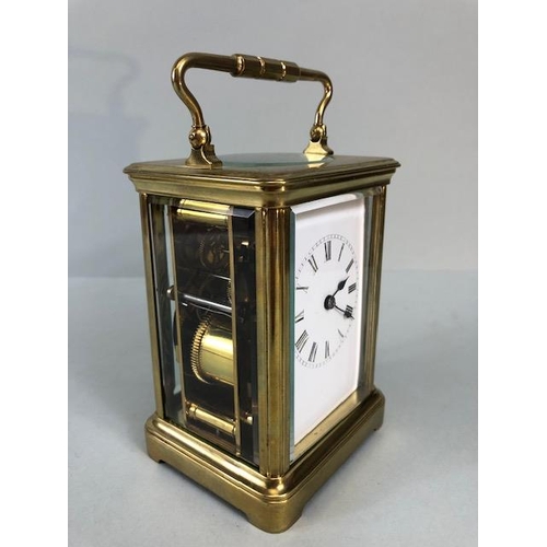 53A - Antique style brass four glass panel chiming carriage clock, white face with roman numerals, approxi... 