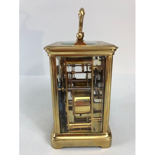 53A - Antique style brass four glass panel chiming carriage clock, white face with roman numerals, approxi... 