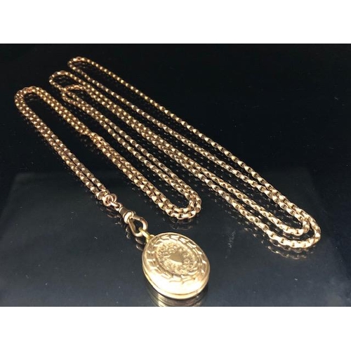 54 - 9ct Gold very long (approx 140cm) chain with a gold coloured Locket (total weight approx 27g)