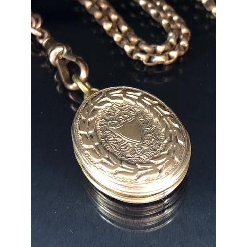 54 - 9ct Gold very long (approx 140cm) chain with a gold coloured Locket (total weight approx 27g)