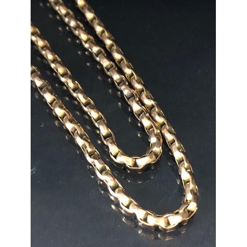 54 - 9ct Gold very long (approx 140cm) chain with a gold coloured Locket (total weight approx 27g)