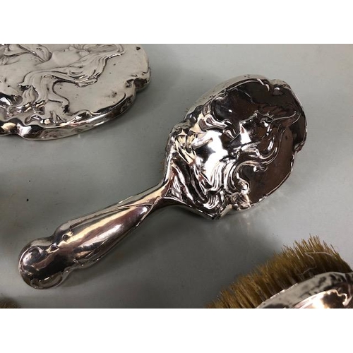 55A - Antique Silver, collection of Silver backed art nouveau design hair brushes and a hand mirror Birmin... 