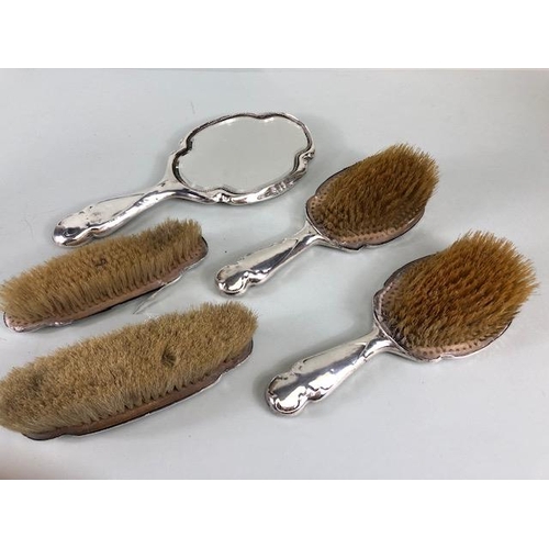 55A - Antique Silver, collection of Silver backed art nouveau design hair brushes and a hand mirror Birmin... 