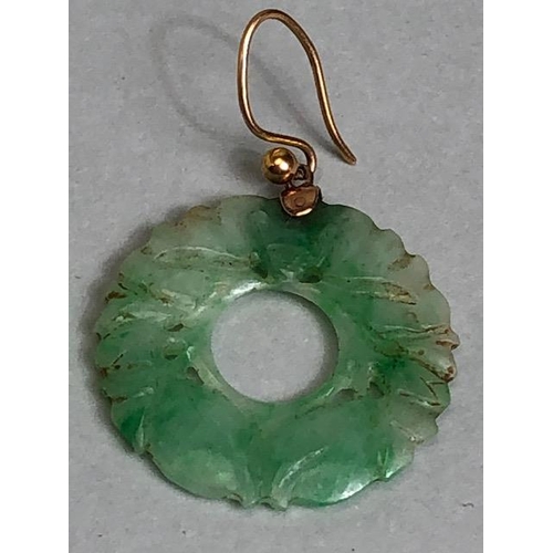 58 - Pair of circular Jade earrings each approx 24mm in diameter and on gold coloured wire possibly Chine... 