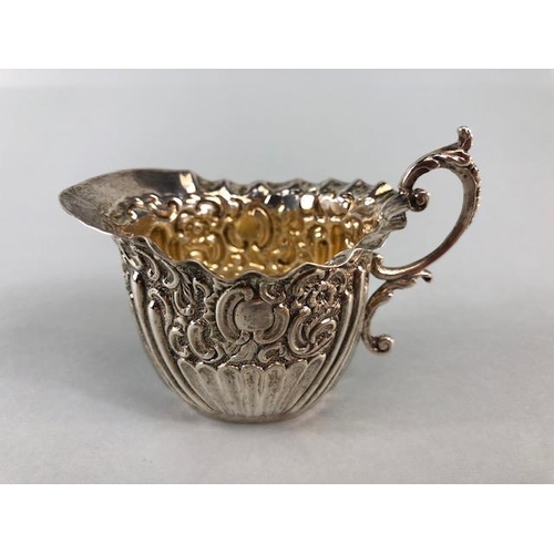 6 - Silver hallmarked creamer for Birmingham with gilt interior by maker Florence Warden approx 7cm tall