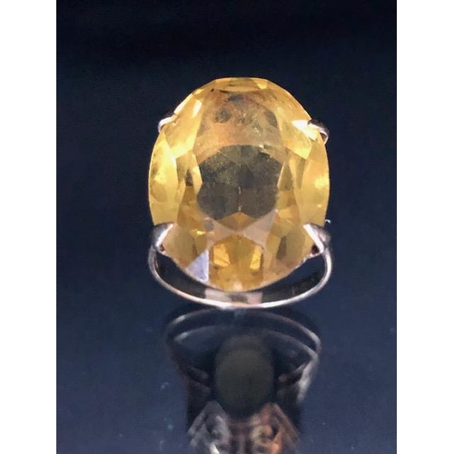 67 - Hallmarks rubbed gold ring set with a large Citrine gemstone approx 20 x 15mm and size 'K'