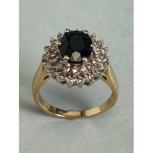 69 - 9ct Gold Sapphire and Diamond cluster ring the central faceted Sapphire approx 7.5 x 9mm and size 'N... 