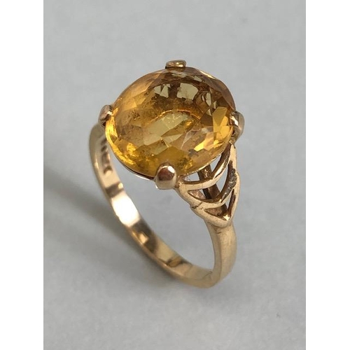 71 - 9ct Gold ring set with a large faceted yellow Citrine gemstone (approx 12 x 10mm) size 'N'