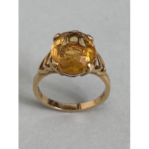 71 - 9ct Gold ring set with a large faceted yellow Citrine gemstone (approx 12 x 10mm) size 'N'