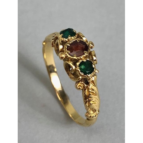 72a - Antique unmarked gold ring of Victorian style design set with gemstones  mounted in scroll work gold... 