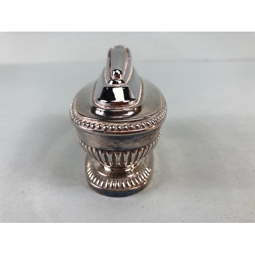 80 - Silver Plated Ronson Table Lighter of classical urn design , stamped to base with reg design marks a... 