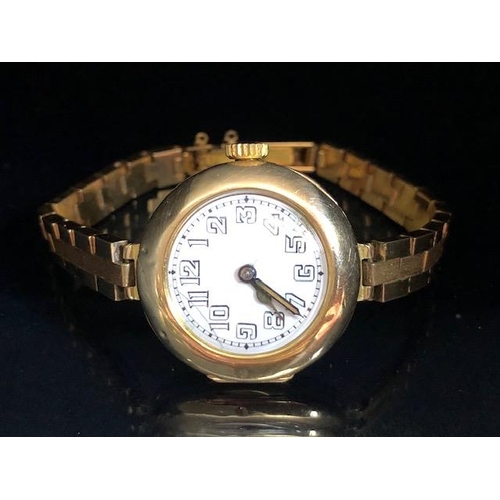 85 - Rolex watch, early 20th century ladies 15ct gold Rolex watch, round white ceramic face with Arabic n... 