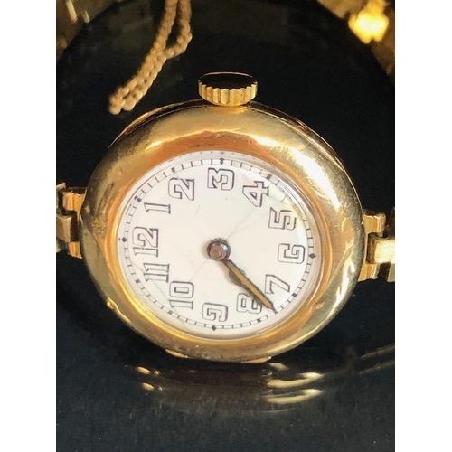 85 - Rolex watch, early 20th century ladies 15ct gold Rolex watch, round white ceramic face with Arabic n... 