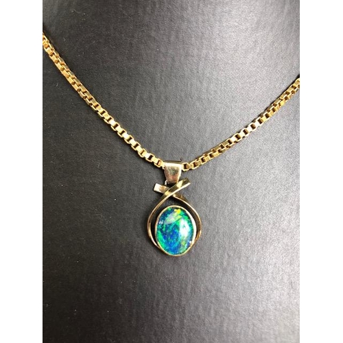 88 - Jewellery, a yellow metal triplet opal pendant on a yellow metal box chain and a yellow metal filigr... 