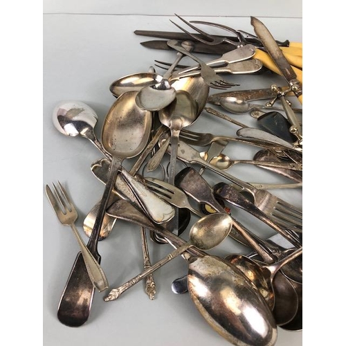 89 - Silver plated, EPNS, and Nickle cutlery , a quantity of spoons, forks, knives, ladles and other item... 