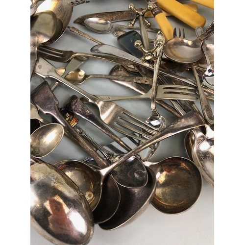 89 - Silver plated, EPNS, and Nickle cutlery , a quantity of spoons, forks, knives, ladles and other item... 