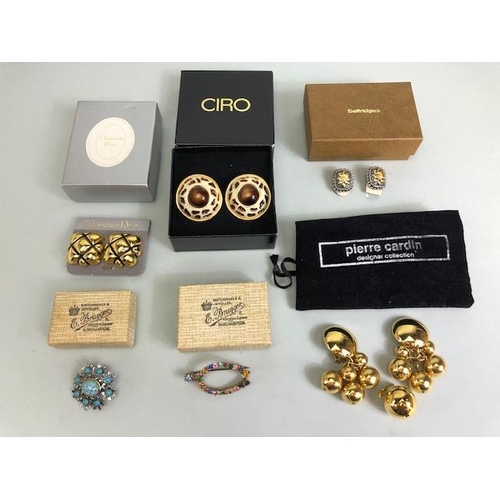 89A - Vintage and designer costume jewellery, Pair of Christian Dior clip on earrings in box with pad, a p... 