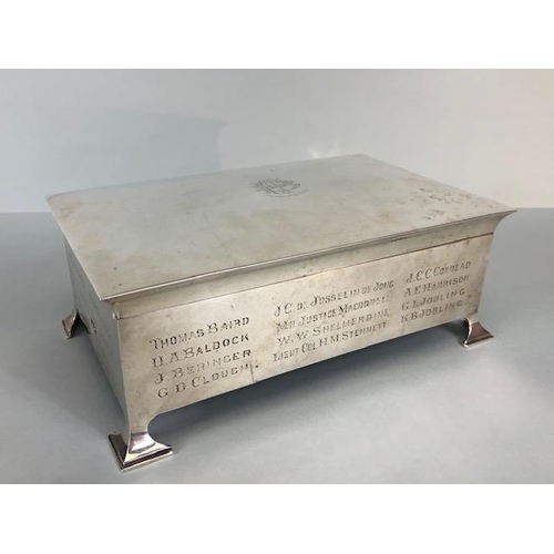 10 - Large Silver hallmarked cigarette box on arrow feet, with cedar lining, crest to lid and names engra... 