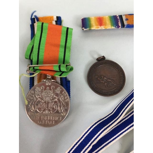 110 - Military interest, collection of military, and civil medals badges, photos and associated items