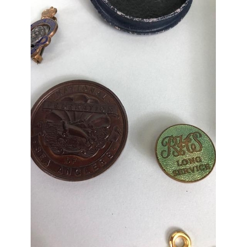 110 - Military interest, collection of military, and civil medals badges, photos and associated items