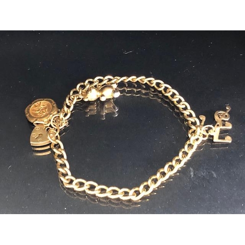 112 - 9ct Gold bracelet with 9ct Gold heart shaped lock and 9ct St Christopher and musical notes total wei... 