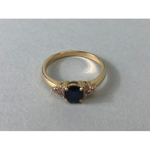 113 - 14ct yellow gold ring size 'L' with certificate set with a Blue Sapphire