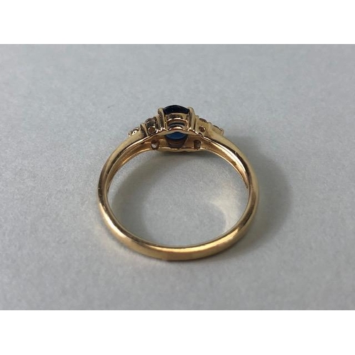 113 - 14ct yellow gold ring size 'L' with certificate set with a Blue Sapphire