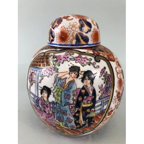 122 - Japanese Imari ginger jar and lid, decorated in typical colours with courtesans in a garden approxim... 