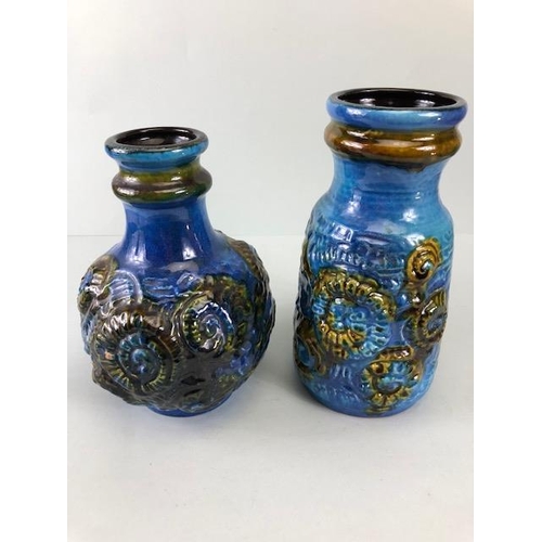 132 - Mid Century pottery, an associated pair of West German vases by, Carstems, decorated in high relief ... 